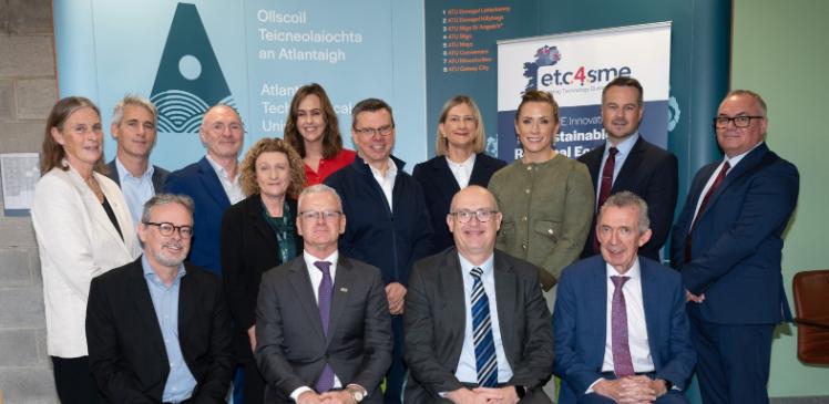 Group of people sitting and standing